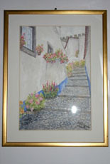 Watercolor painting-Private collection-(Portugal)One characteristic Obidos street,on the background crenelate walls that they encircle the small town and they culminate in the castle.